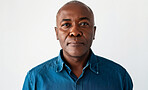 Studio, serious and portrait of black man with pride for therapy job, career and counselling. Therapist, mature person and face with confidence for mental health, service and help on white background