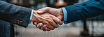 Teamwork, partnership and business people with handshake in deal for agreement, greeting and welcome. Corporate, professional and lawyer with support for legal planning, collaboration and negotiation