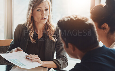 Buy stock photo Businesswoman, meeting and paper with graphs in office for feedback, check on growth stats for crypto market. Female broker, couple and chart document for update on financial portfolio or investment