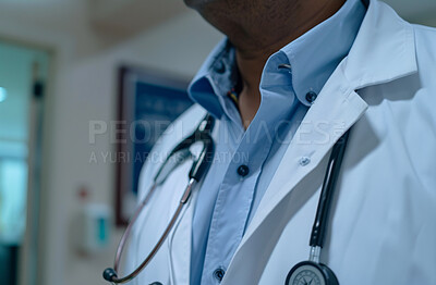Healthcare, trust and doctor with stethoscope in hospital for wellness appointment, coat or surgery. Closeup, medical worker or cardiology with tools for checkup, consulting or professional in clinic
