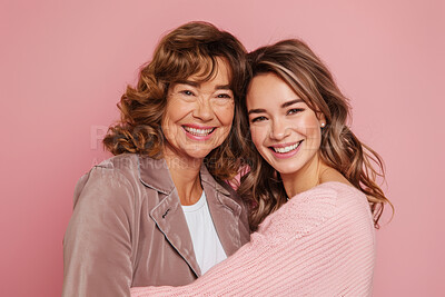 Mature, mom and daughter in studio with portrait for smile or happiness for family with gen z. Motherhood, respect and relationship with parent, pink background and love in confidence or positivity