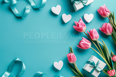 Mockup space, flowers and present with blue background for valentines day or birthday with pink tulips. Ribbons, banner and template for mothers day card with thank you, empty and white hearts.