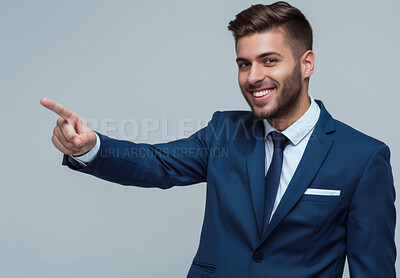 Businessman, pointing and smile on mockup for marketing, product placement and notification for sale. Portrait, happy man and space for showing info with advertising and offer by studio background