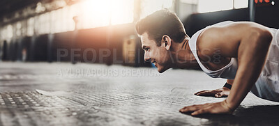 Buy stock photo Fitness, floor and man with push ups in gym for power workout, endurance exercise or strength challenge. Wellness, athlete and person lifting body weight for muscle gain, training or performance 