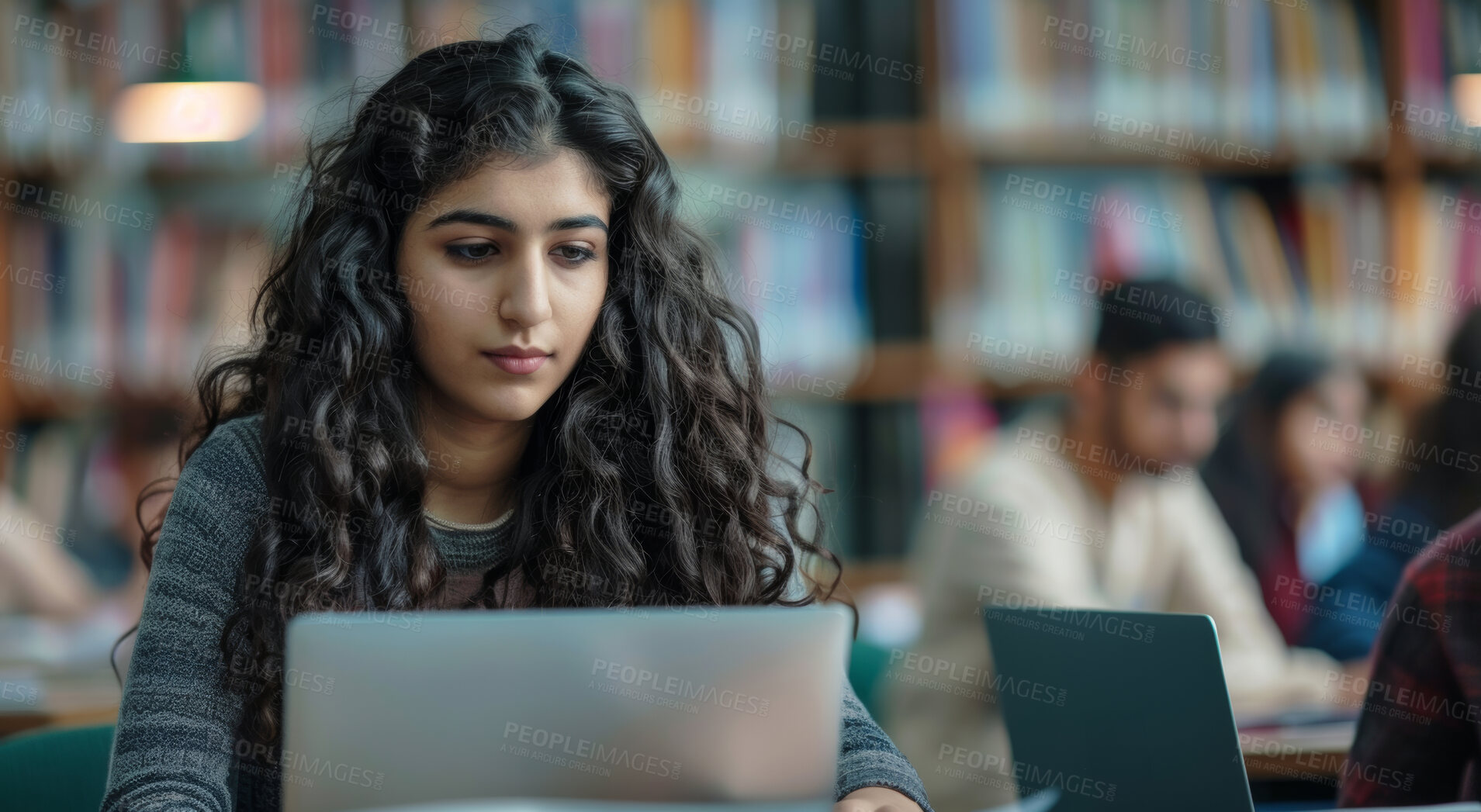 Buy stock photo Laptop, reading and woman in college library studying for exam, assignment or test online. Education, technology and female student working on university project with computer in classroom at campus.