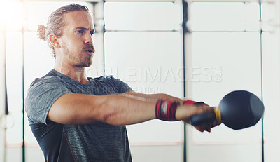 Buy stock photo Man, kettlebell and arm exercise in gym for fitness, strong body and muscle development for health. Male person, breathe and weight training in sports club for power workout, performance and wellness