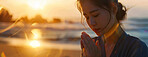 Woman, peace and ocean with prayer at sunset for spiritual, worship in nature for Jesus. Female person, calm and beach with hands for God or hope in banner, faith and mindfulness with prayer