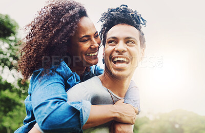 Buy stock photo Couple, piggyback and smile for love, outdoor and happy in relationship, commitment and trust in date. Relax, fun and break for romance in weekend, people and joy in park, bokeh and peace in nature