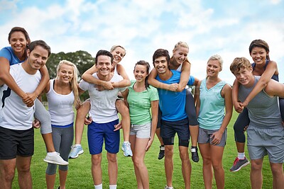 Buy stock photo Group, friends and happy on field with piggyback for fitness, sport and exercise with collaboration. Teamwork, men and women with portrait, smile or blue sky outdoor in nature for workout or training