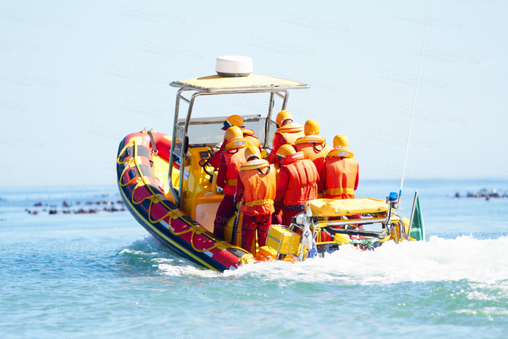 Buy stock photo Shot of a group of search and rescue personnel on maneuvers