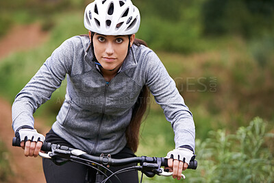 Buy stock photo Nature, cycling and woman cyclist with bicycle for fitness in an outdoor park training for race or marathon. Sport, exercise and female athlete riding bike for cardio workout in field or forest.