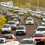 Traffic jam, highway and street in city for driving, transportation or travel in rush hour. Busy urban road, cars and transport in Cape Town metro with congestion, infrastructure network and outdoor