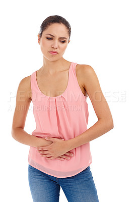 Buy stock photo Stomach ache, pain and woman on a white background with indigestion, period stress and injury. Health, sick and isolated person holding abdomen for nausea, belly problems and tummy cramps in studio