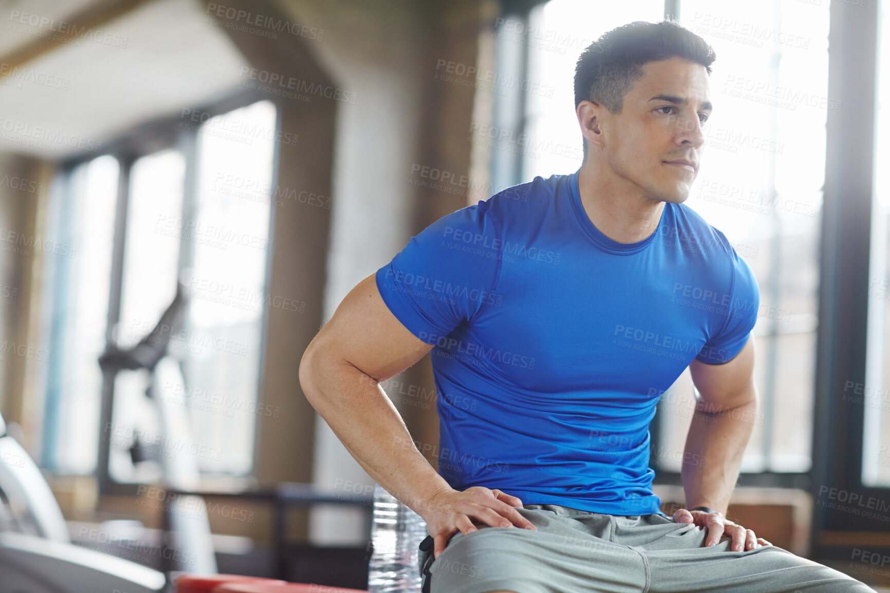 Buy stock photo Fitness, health and happy man with water after training for bodybuilder competition. Sport, exercise and male athlete in portrait with smile and drink for energy to practice weight lifting at gym