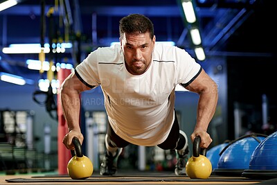 Buy stock photo Portrait, man and workout with kettlebell for push up in gym, wellness or healthy body. Press up, person and strong bodybuilder with weights for muscle, power or training to exercise at fitness club