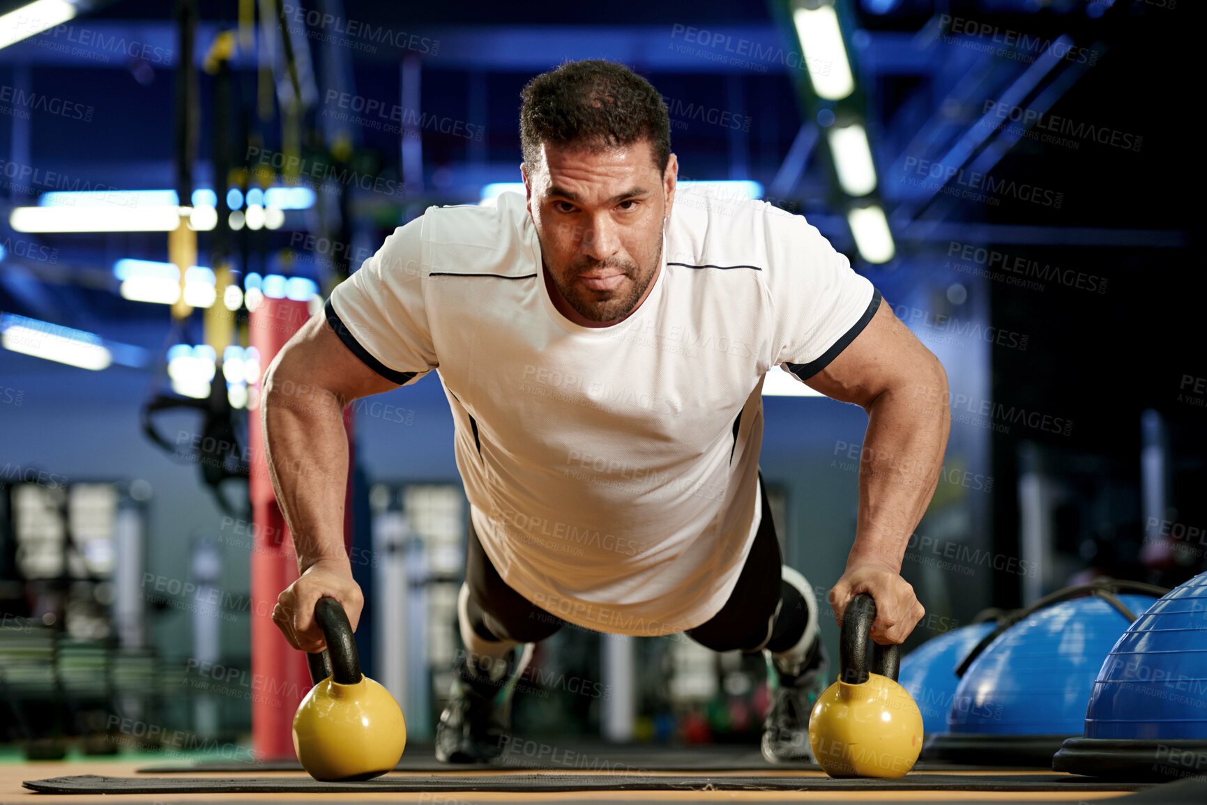 Buy stock photo Portrait, man and workout with kettlebell for push up in gym, wellness or healthy body. Press up, person and strong bodybuilder with weights for muscle, power or training to exercise at fitness club