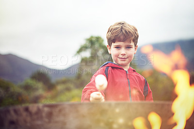 Buy stock photo Outdoors, fire and boy in portrait with marshmallow for cooking on flame with happiness. Roast, smile and camping with sweets for scenic mountain in winter morning at campsite in Switzerland.