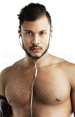 Buy stock photo Studio, muscle and portrait of man, earphones and athlete from exercise, workout and gym for fitness. White background, body builder and person with headphones, audio or abs with results for wellness