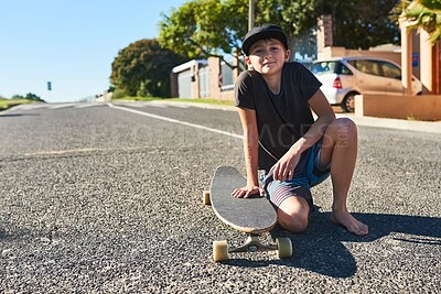 Buy stock photo Street, outdoor and portrait of kid with skateboard on vacation, holiday or relax in Florida summer. Happy, child and travel on neighborhood road with safety on board or cool gen z fashion and style