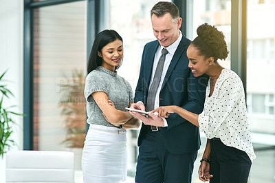 Buy stock photo Smile, business and people with tablet in office for ideas, planning and support as teamwork for development of project. Happy, man and woman with digital tech to review sales report on website