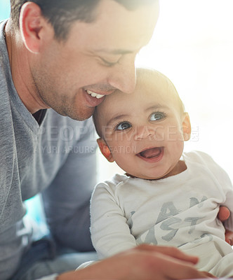 Buy stock photo Happy, love and father hug baby for family wellbeing, care and support for bonding at home. Smile, man and dad cuddle with child together for trust, wellness and infant for development in apartment