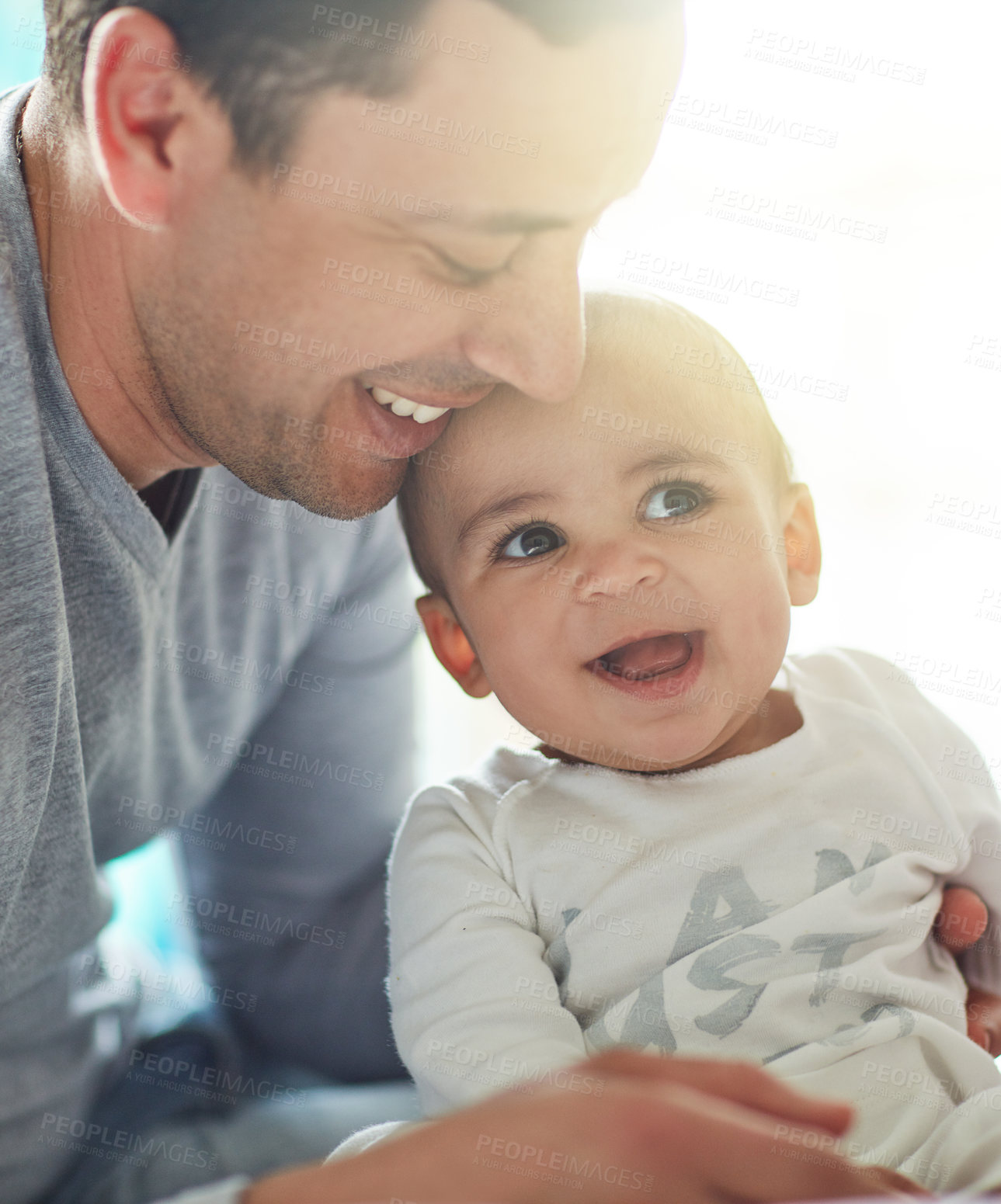 Buy stock photo Happy, love and father hug baby for family wellbeing, care and support for bonding at home. Smile, man and dad cuddle with child together for trust, wellness and infant for development in apartment