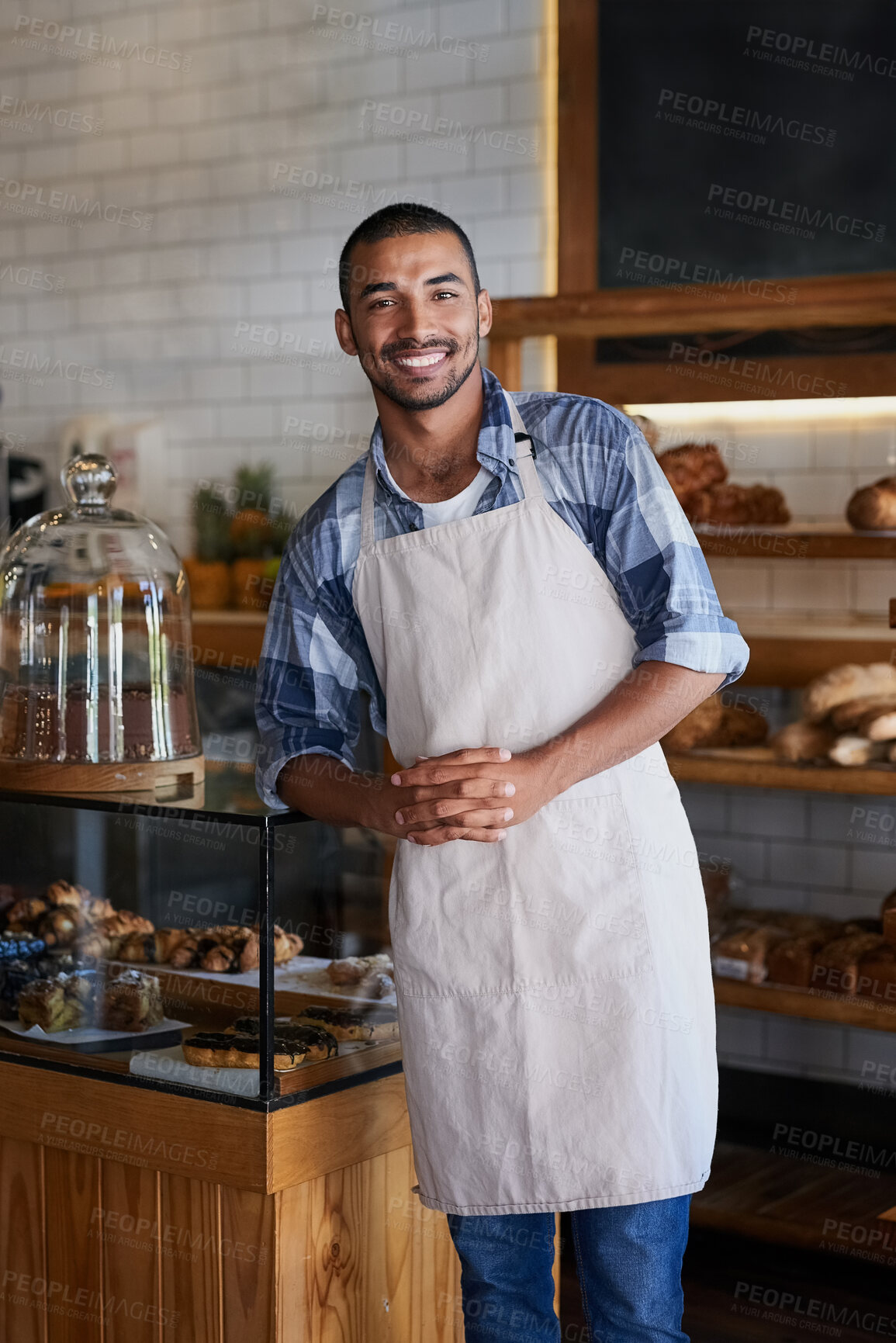 Buy stock photo Bakery, cafe and male owner for business, portrait and smile for small scale restaurant and service. Kitchen, pastry and baker for entrepreneur in hospitality, shop and man for food industry