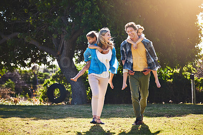 Buy stock photo Family, happy and piggyback in garden with love for bonding, weekend fun and games in home with sunshine. Parents, kids and carry on back for summer activity, outdoor scenery or smile on morning walk