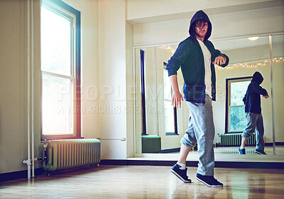 Buy stock photo Dance, fitness and man in studio with practice for concert, recital or performance at creative school. Art, hip hop and dancer moving to song, music or radio for rehearsal with energy and rhythm.