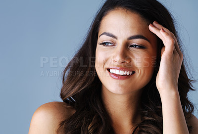 Buy stock photo Happy woman, makeup and thinking in studio for cosmetics, beauty or facial glow on blue background. Salon, aesthetic and model with gloss lips for glamour self care, satisfaction or cosmetology