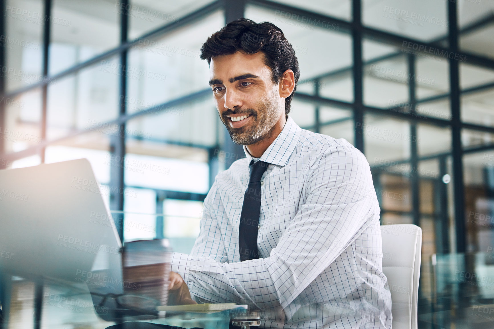 Buy stock photo Business man, laptop and reading in office with smile, thinking or decision with review for report. Person, actuary and computer for statistics, analysis or problem solving in job at insurance agency