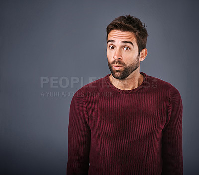 Buy stock photo Studio, portrait and surprise of man, rumor and hearing of secret, confused and gossip of news in mockup. Black background, drama and listening of person, space and face of question for information