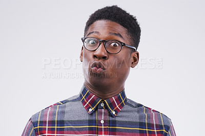 Buy stock photo Black man, glasses and portrait in studio for surprise, gossip and pout on white background. Shocked, comic and male person with spectacles for nerd, unbelievable and reaction to meme or story