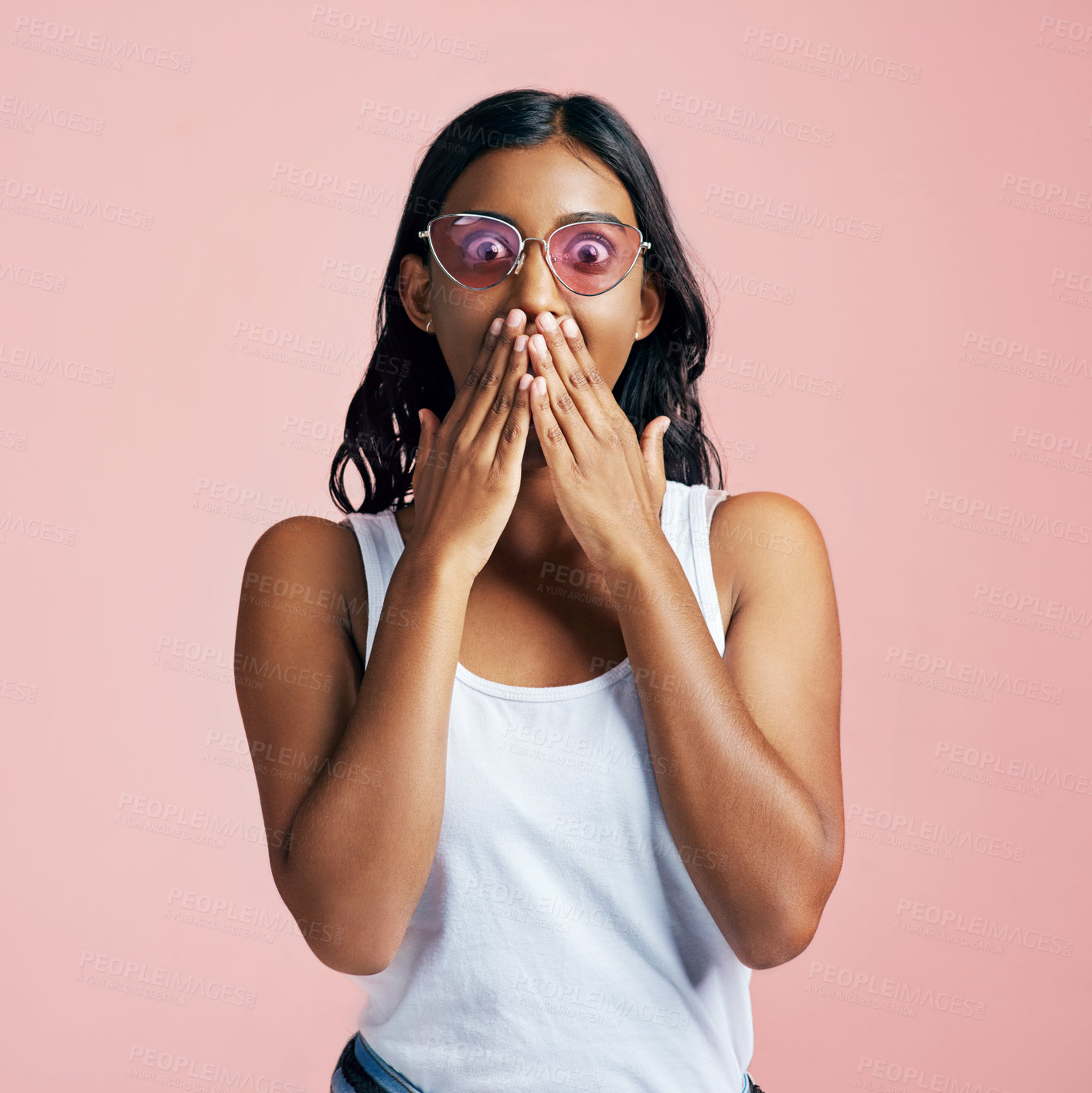 Buy stock photo Woman, shocked or hands for covering mouth in studio, retro sunglasses and surprise for notification. Female person, pink background or wow for announcement, portrait with news or big secret