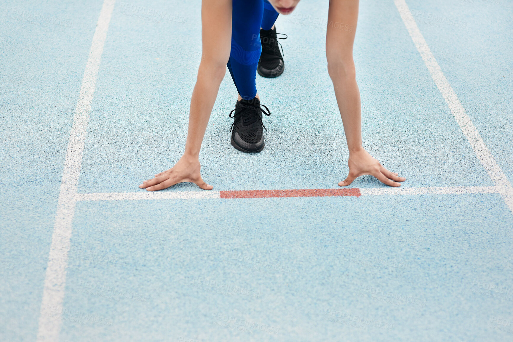 Buy stock photo Female athlete, runner and start for sports, exercise and warm up in stadium or field for fitness. Woman, arms and training on track in outdoor for wellness, performance and strong in body or mind