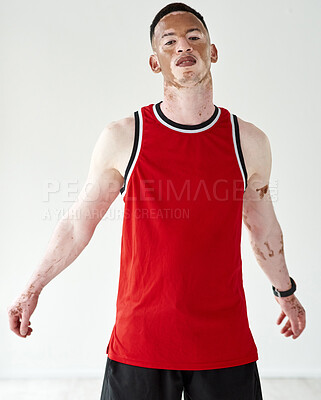 Buy stock photo Athlete, portrait and man in white studio background with confidence, style and cool tattoos. Male person, vitiligo and tank top with ink for basketball practice, fitness and working out in summer