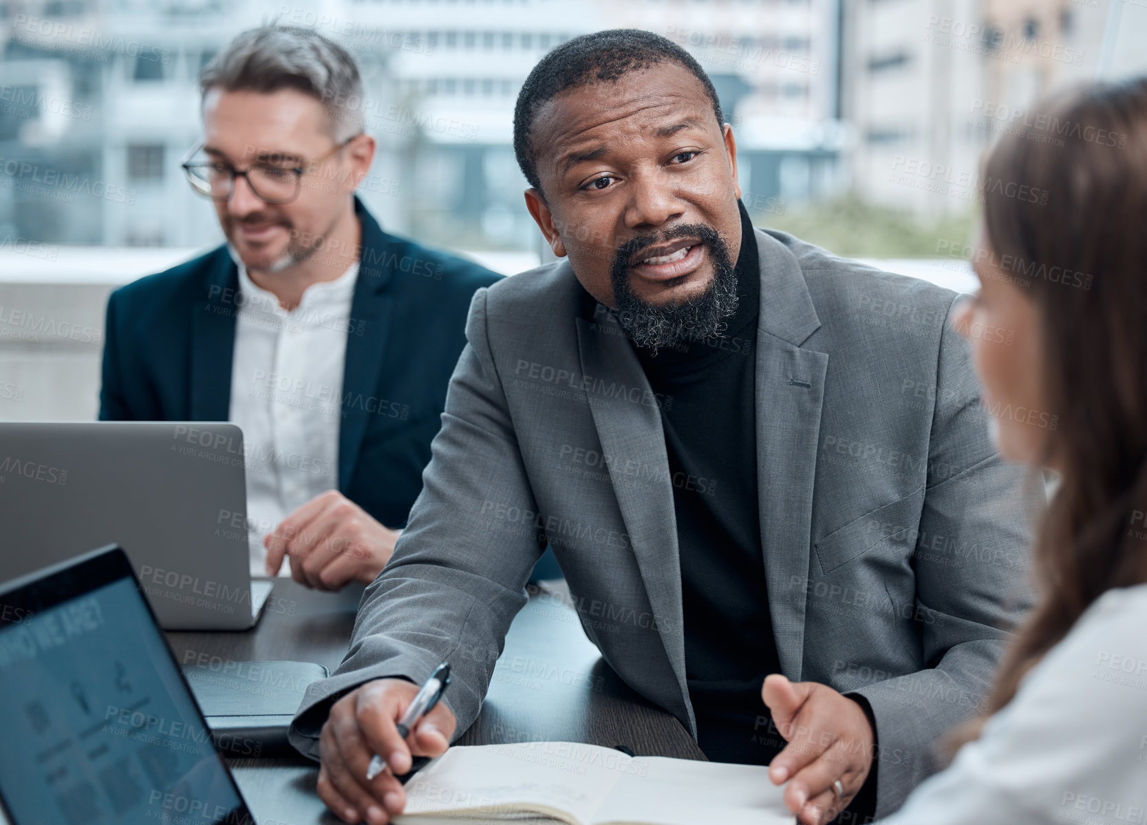Buy stock photo Black man, manager and mentor with laptop for instruction in office for meeting, strategy and discussion in workplace. Businessman, coaching and computer on desk for planning, support and guiding