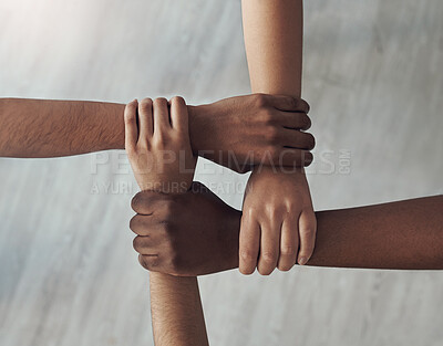 Buy stock photo Cropped shot of a group of unrecognizable people holding each others wrists