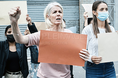 Buy stock photo Protest, people and mature woman with poster for social justice, change and anti vaccine. Senior person, community and rally with banner for announcement, broadcast for attention to human rights
