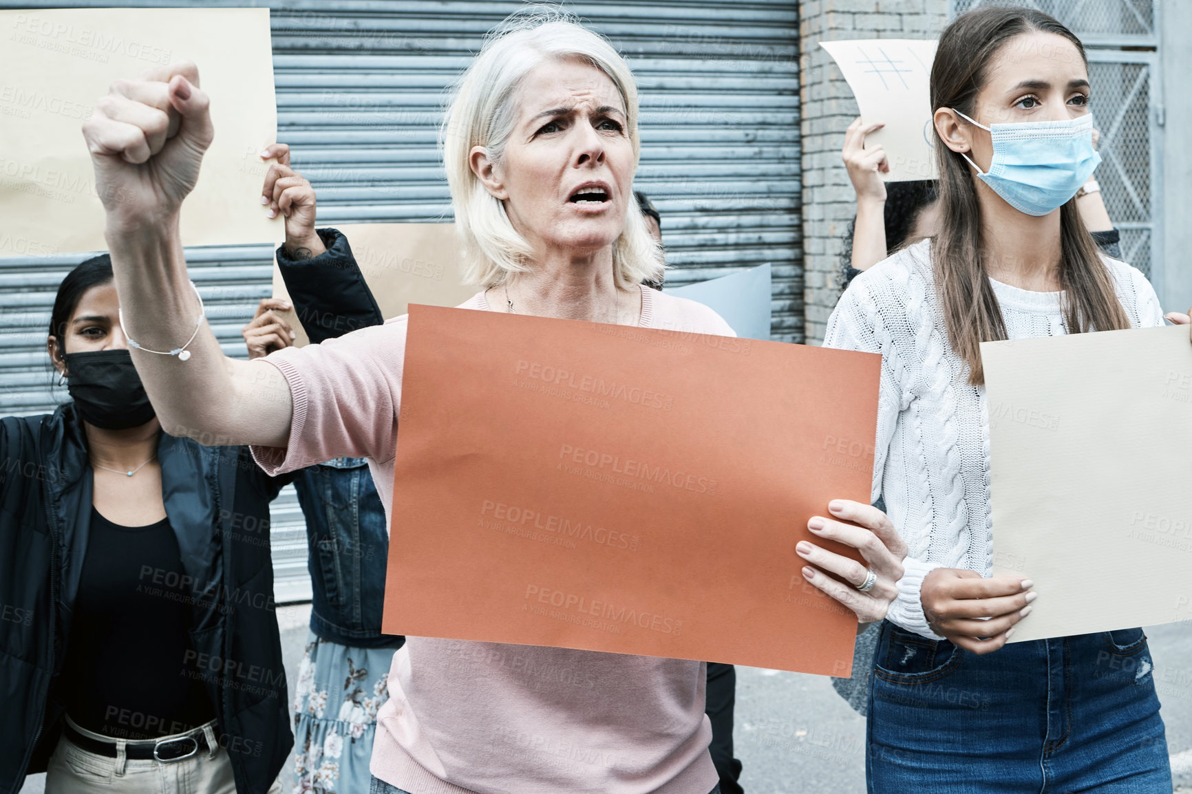 Buy stock photo Protest, people and mature woman with poster for social justice, change and anti vaccine. Senior person, community and rally with banner for announcement, broadcast for attention to human rights