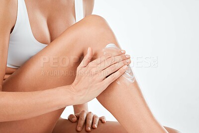 Buy stock photo Studio, lotion and skin of legs, hands and hair removal for skincare, healthy and cosmetics in mockup. White background, relax and moisturiser of person with treatment, cream and soft with shine of body