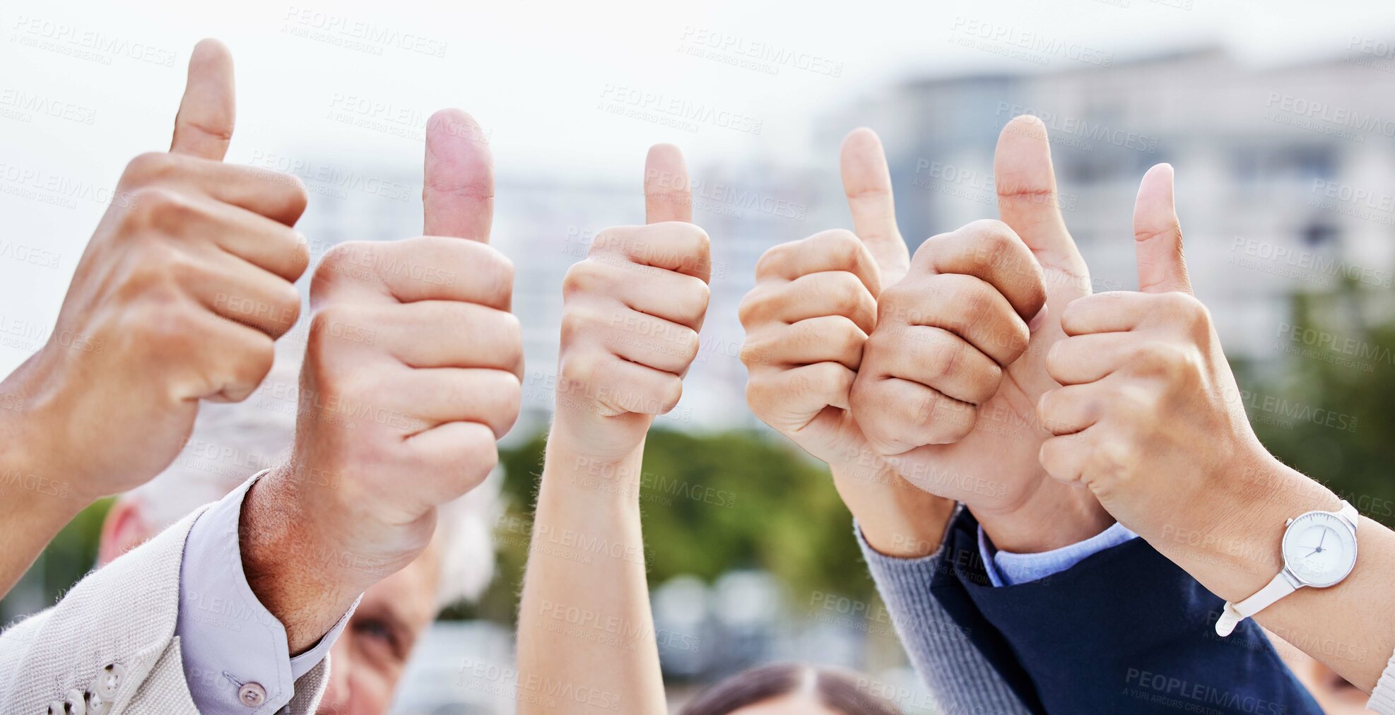 Buy stock photo Corporate, business people and hands with thumbs up in city for team building, support and motivation. Employees, meeting and celebration with emoji for partnership, success and good news in New York