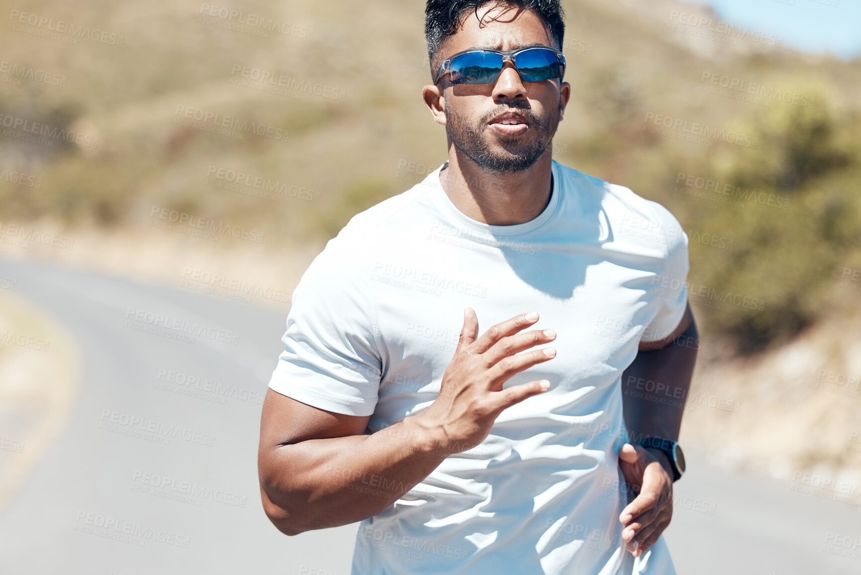 Buy stock photo Man, fitness and running in nature for exercise, cardio workout or training outdoors. Fit, active and sporty male person, athlete or runner exercising on mountain asphalt, road or street outside