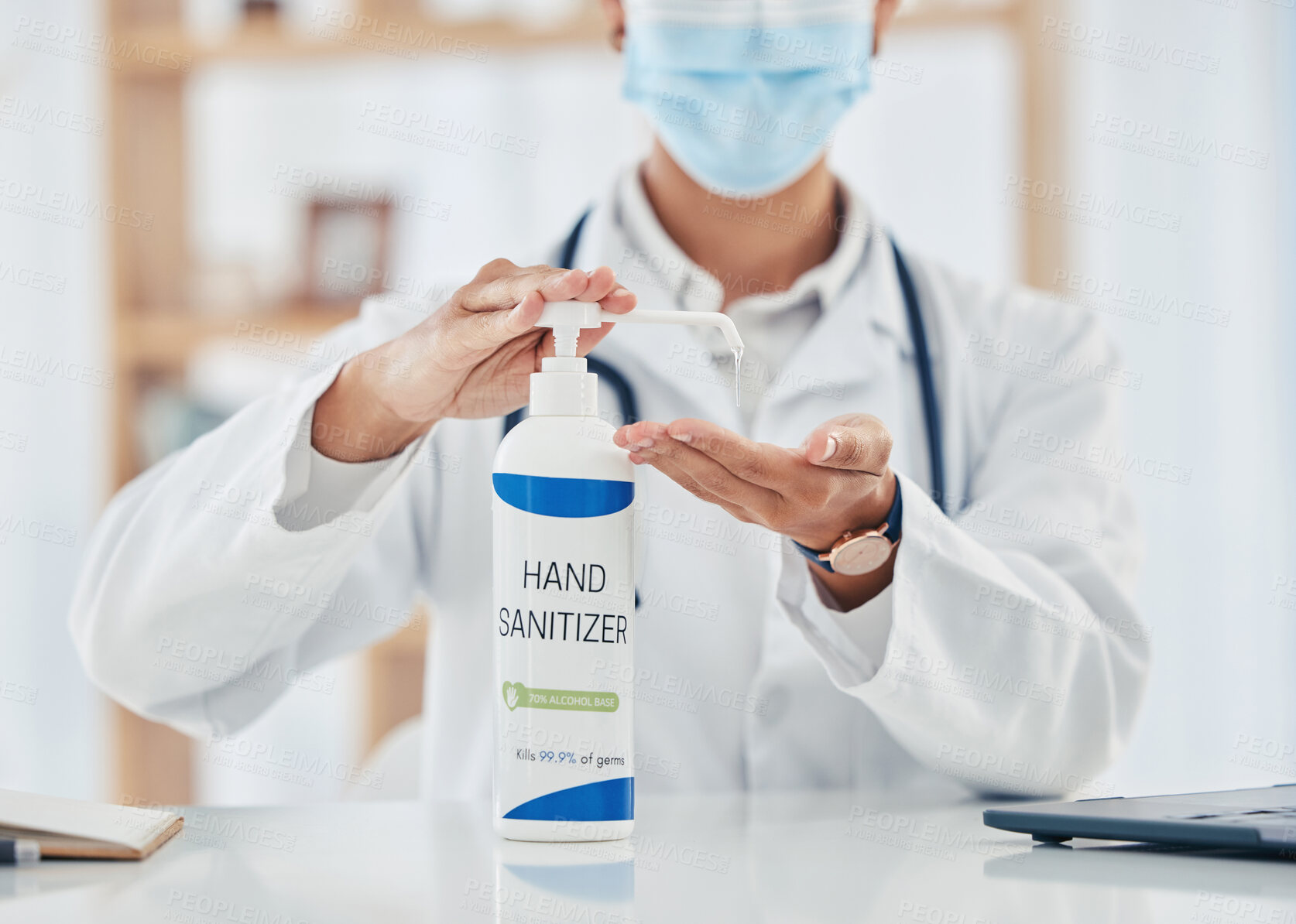 Buy stock photo Covid, hand sanitizer and hygiene with doctor, pharmacist or medical healthcare professional with a face mask. Health, insurance and consulting in hospital, clinic or office with expert behind desk