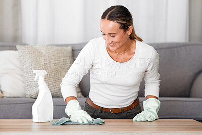 Buy stock photo Living room, cleaner and woman cleaning table with product, spray bottle and rubber gloves in modern home. Happy worker in apartment using soap liquid, hygiene detergent for spring clean service