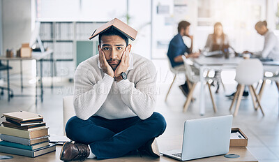 Buy stock photo Laptop, books and businessman in training fail, burnout and  stress with overwhelm workload in office, depression and tired. Corporate, business and sad man on a table, bored and moody while working