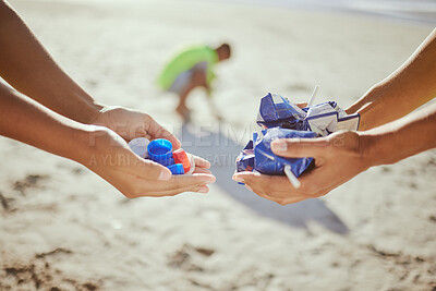 Buy stock photo Hands, trash collection and beach clean up help for climate change wellness, environment sustainability or global warming change. Zoom, cleaning people and holding plastic garbage for ocean recycling