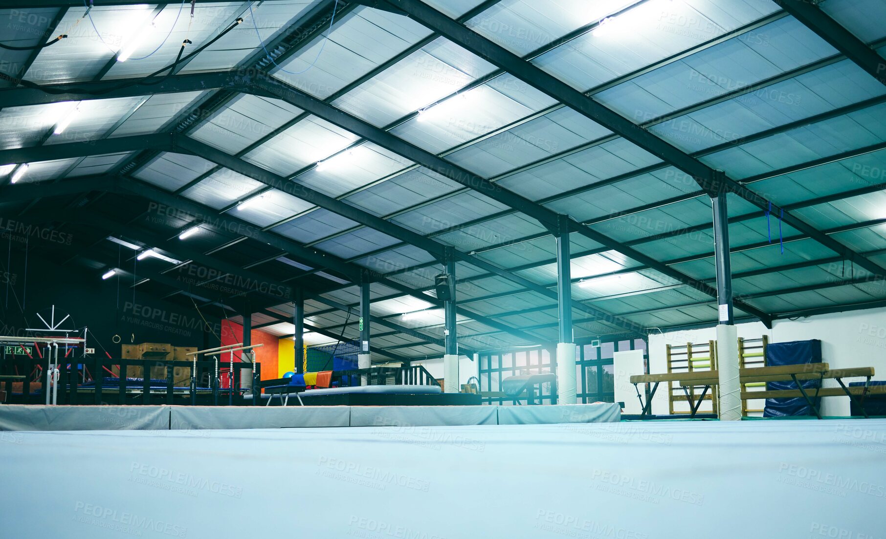 Buy stock photo Interior hall of empty gymnastics arena, building and floor for training, professional performance or class. Backgrounds, studio space and room for sports, workout or indoor athletic practice