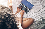 Hands, top view and typing on laptop on bed in bedroom for social media or web browsing in the morning. Technology, remote worker and woman working on project, writing email or research on computer.