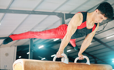 Buy stock photo Horse, gymnastics and exercise with a sports man training for an event or competition. Fitness, balance and games with a male athlete or gymnast in a studio or gym for competitive sport